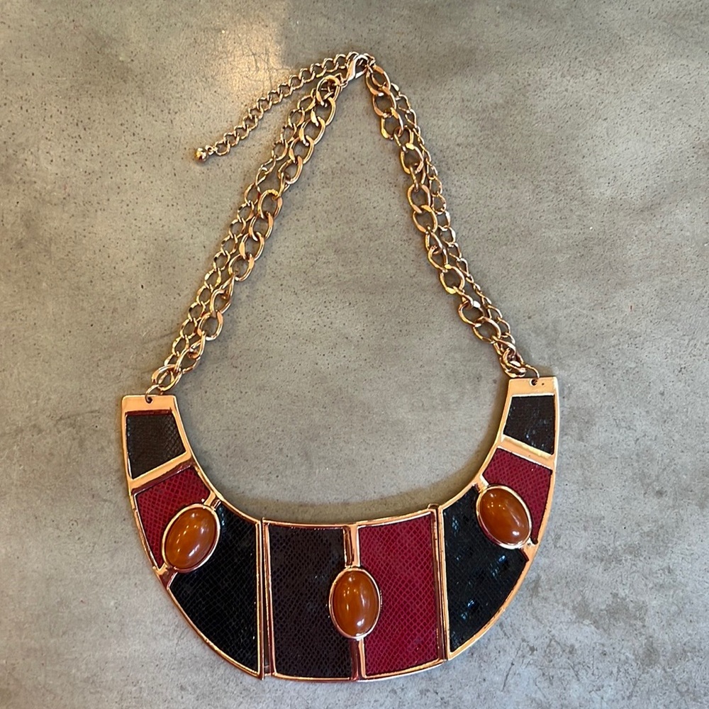 Rose gold colored black and red statement necklace